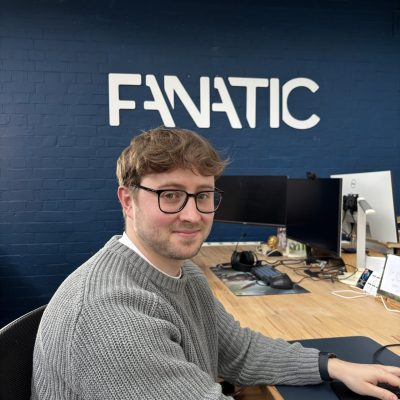 Sam C sitting at his desk in the Fanatic office