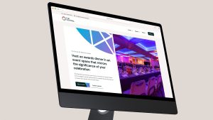 Desktop monitor displaying The Central London website page promoting awards dinner events, alongside a photograph of a purple-lit banquet room.